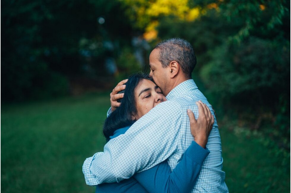 Patient embracing loved one after experiencing personal growth via IFS.