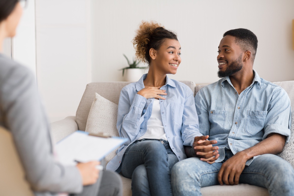 Couple expressing fondness and admiration for each other during Gottman Method exercise