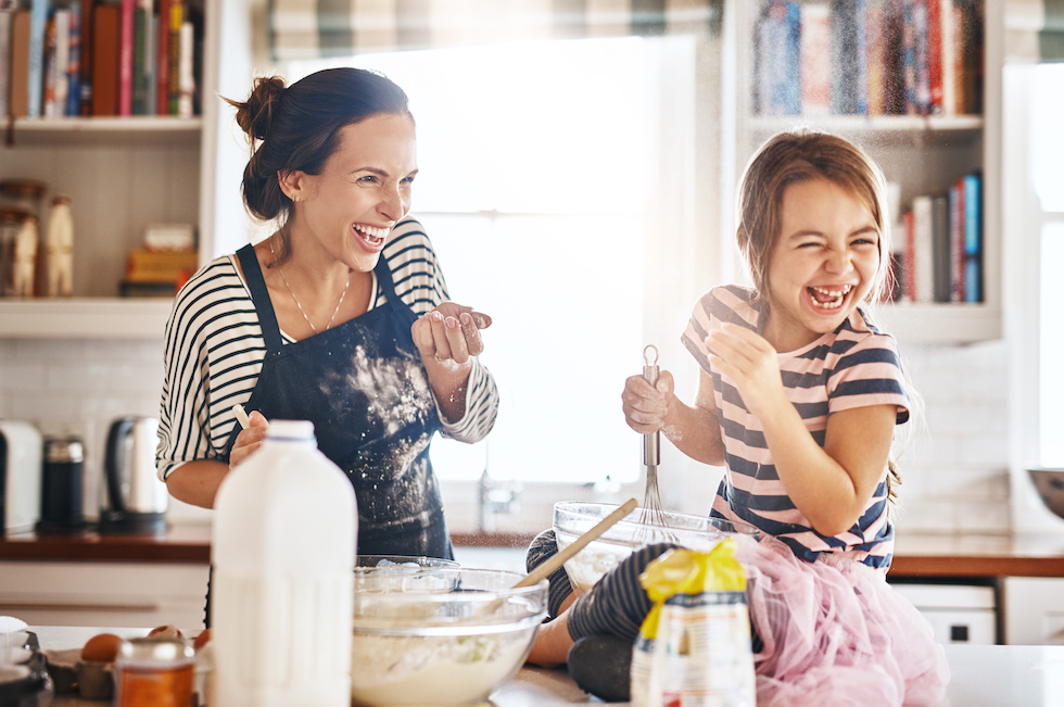 Young Girl Baking and Having Fun With Her Mom