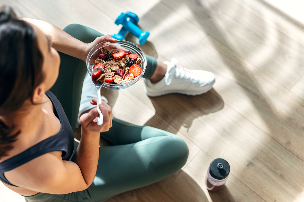 Woman Eating a Healthy Snack After a Workout